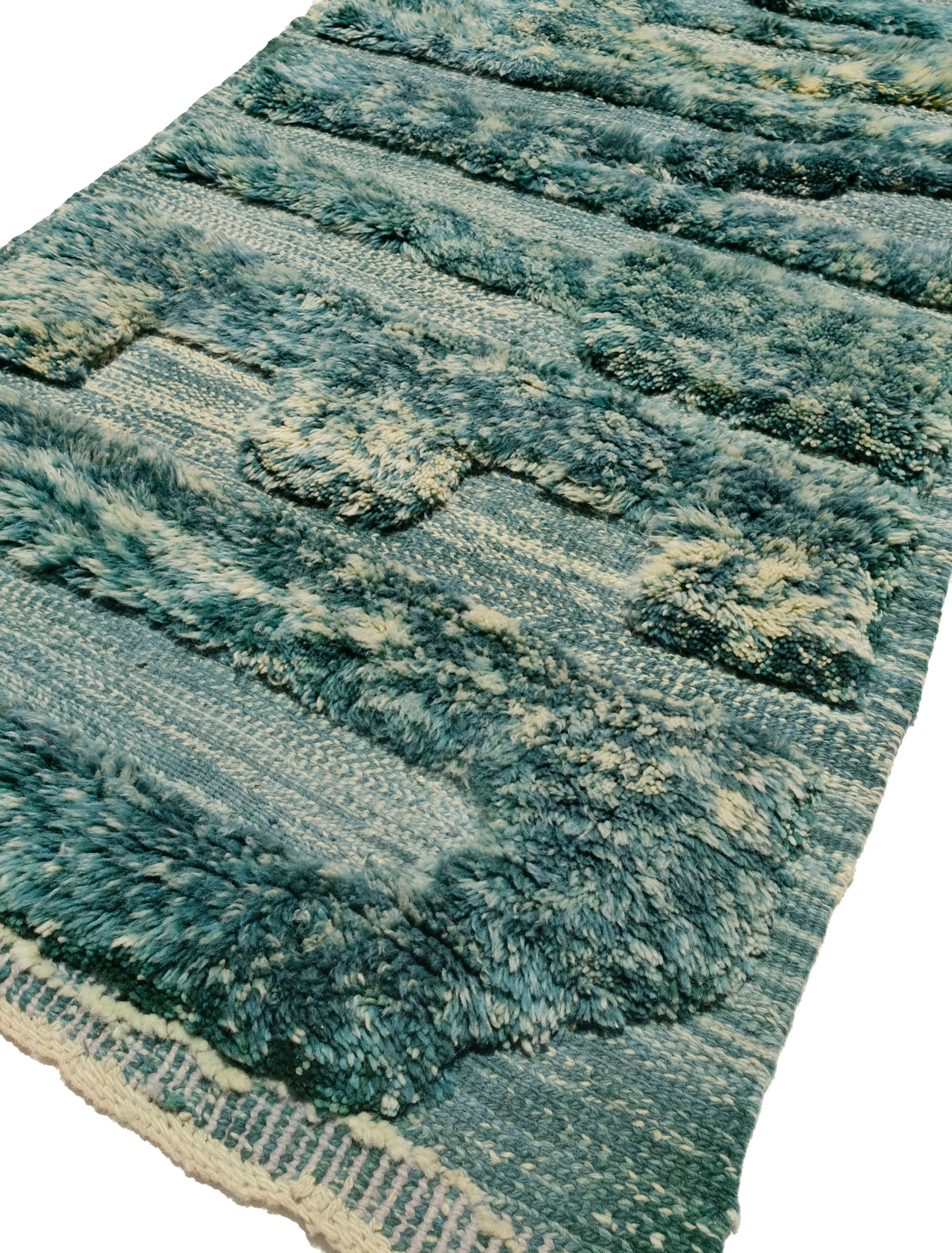 "Verdant Whispers Wanted Rug" – lush greens and an intriguing message woven with a playful touch. Perfect for adding a unique, contemporary element to your space.