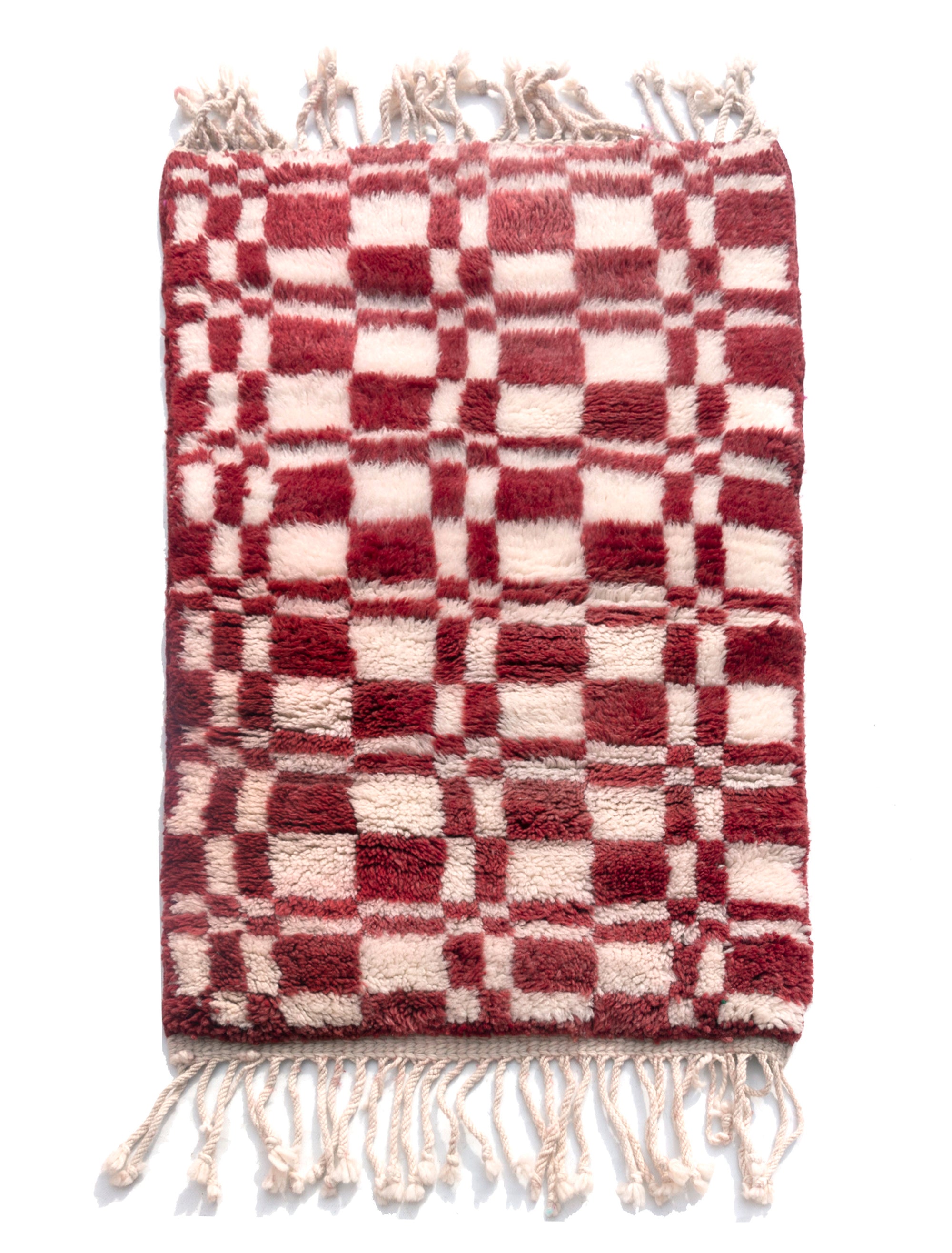 Introducing our 'Crimson Touch Chess Rug,' a beautifully crafted piece featuring a classic navy and ivory checkerboard pattern with a captivating crimson twist. Elevate your space with this rug that seamlessly blends sophistication with playfulness, adding a touch of timeless elegance and vibrant charm to your home décor.