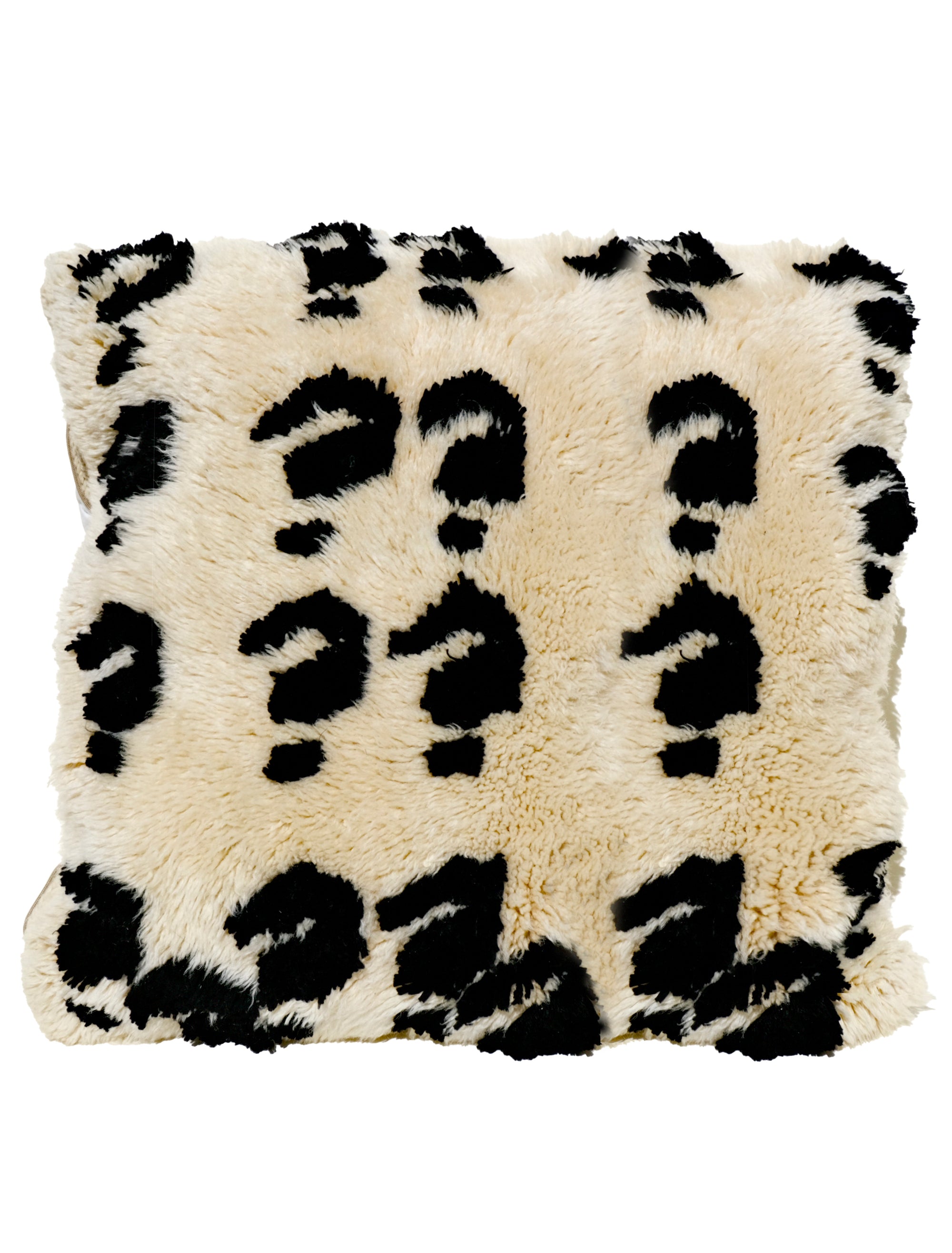 Introducing the "Question Marks" cushion – it's like a soft puzzle for your space! The ivory base is sprinkled with cute black question marks, making it fuzzy, soft, and a little bit quirky. Sized at 55x55cm, it's a cozy addition with a touch of playful elegance. Perfect for those who like their décor with a hint of curiosity