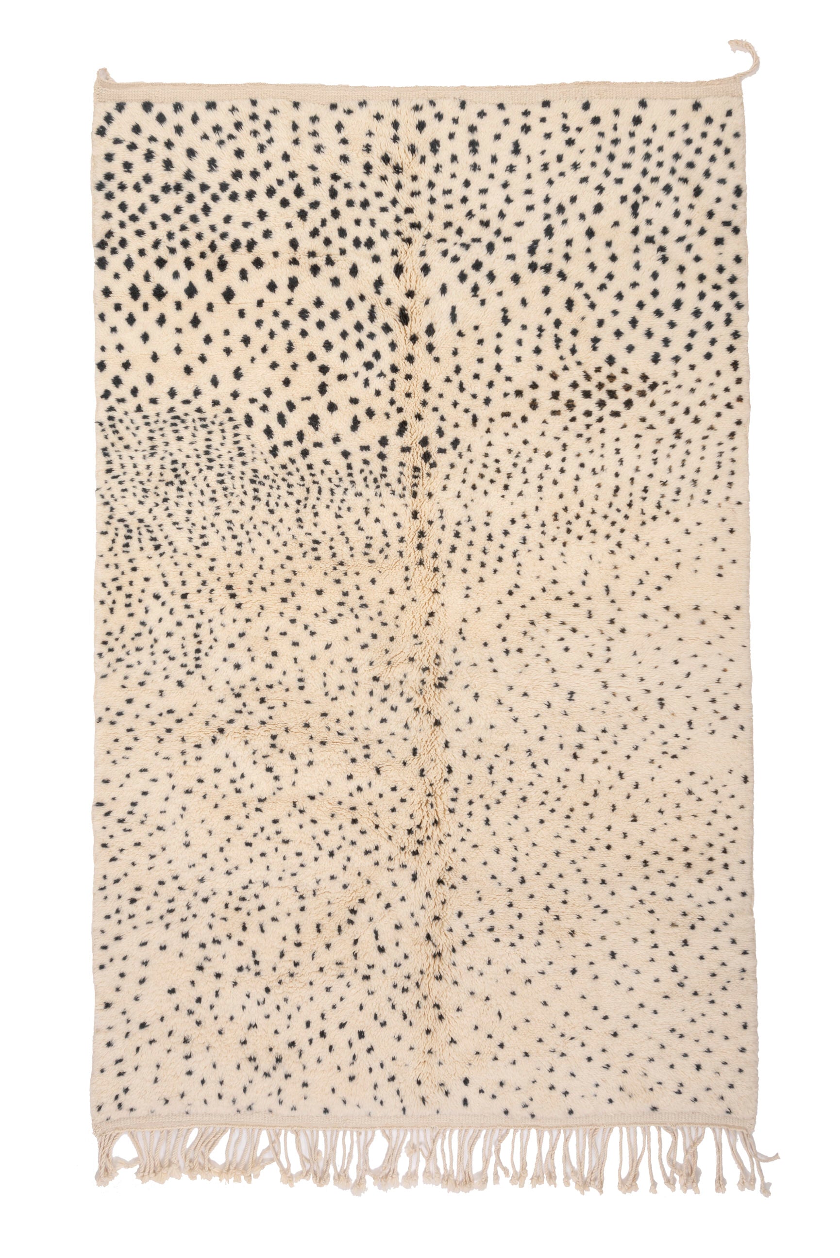 Elevate your interior with our 'Ivory Dotted Mirage Rug.' Featuring a playful pattern of degrading polka dots that transition from a dense cluster at the top to a scattered arrangement at the bottom, this rug adds a touch of whimsy and style to your space.