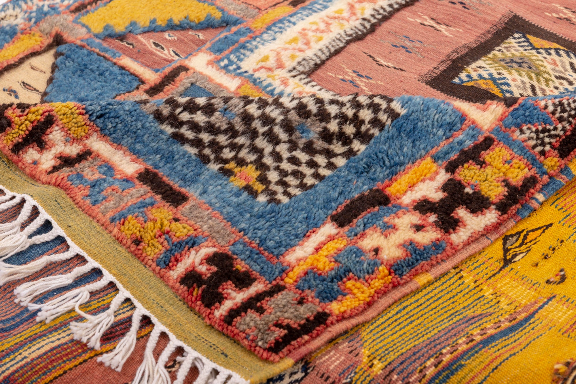 Indulge in the timeless allure of our Sunset Serenity Glawi Rug. With a classic geometric glawi pattern adorned in a mix of vintage blue, pink, and yellow tones, this rug exudes charm and character. Elevate your space with the artistry of traditional craftsmanship and the soothing hues of a bygone era.
