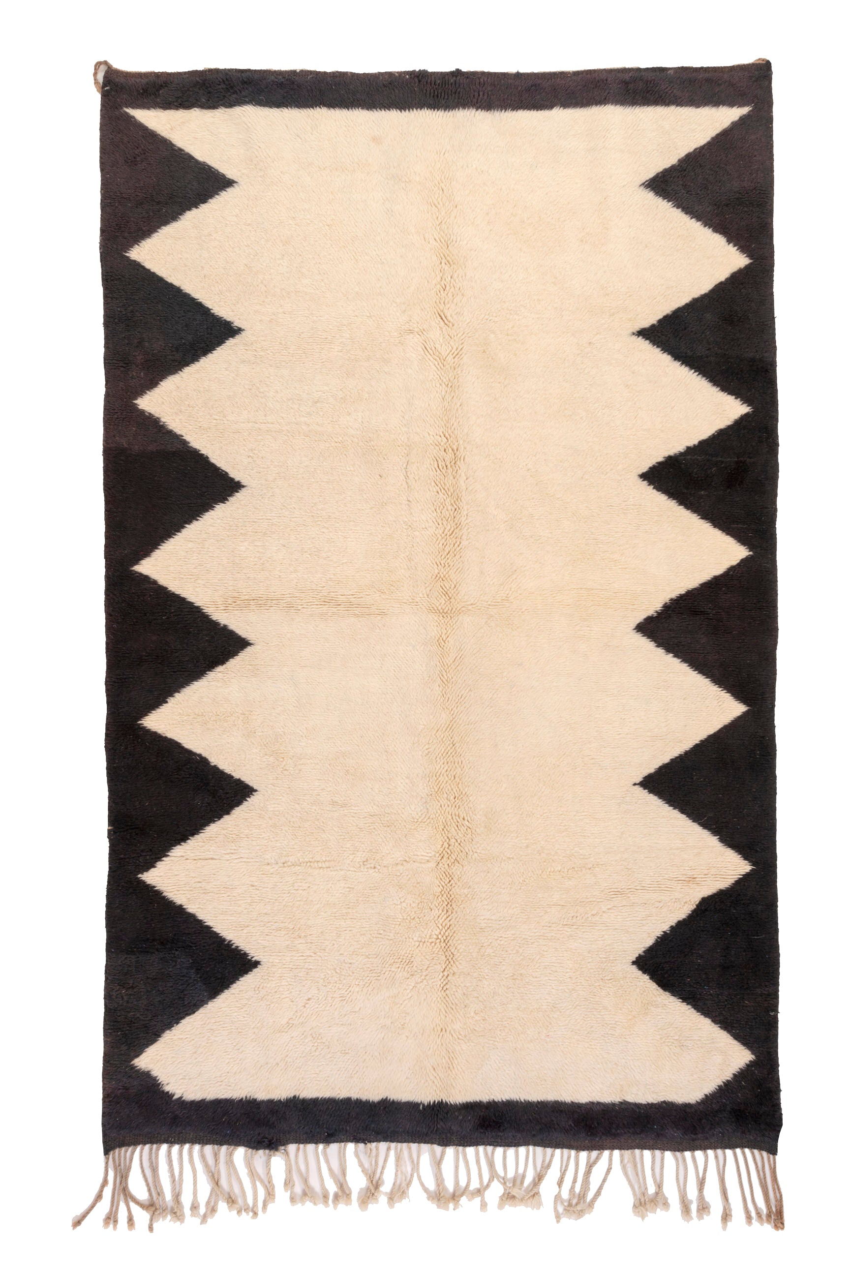 Elevate your space with our Ivory Triangle Border Beni Ourain Rug. This classic piece features a timeless ivory base adorned with a striking black triangle border, creating a harmonious blend of traditional Moroccan design and modern elegance. Crafted with care, this rug adds a touch of sophistication to your decor, making it a perfect addition to your home.