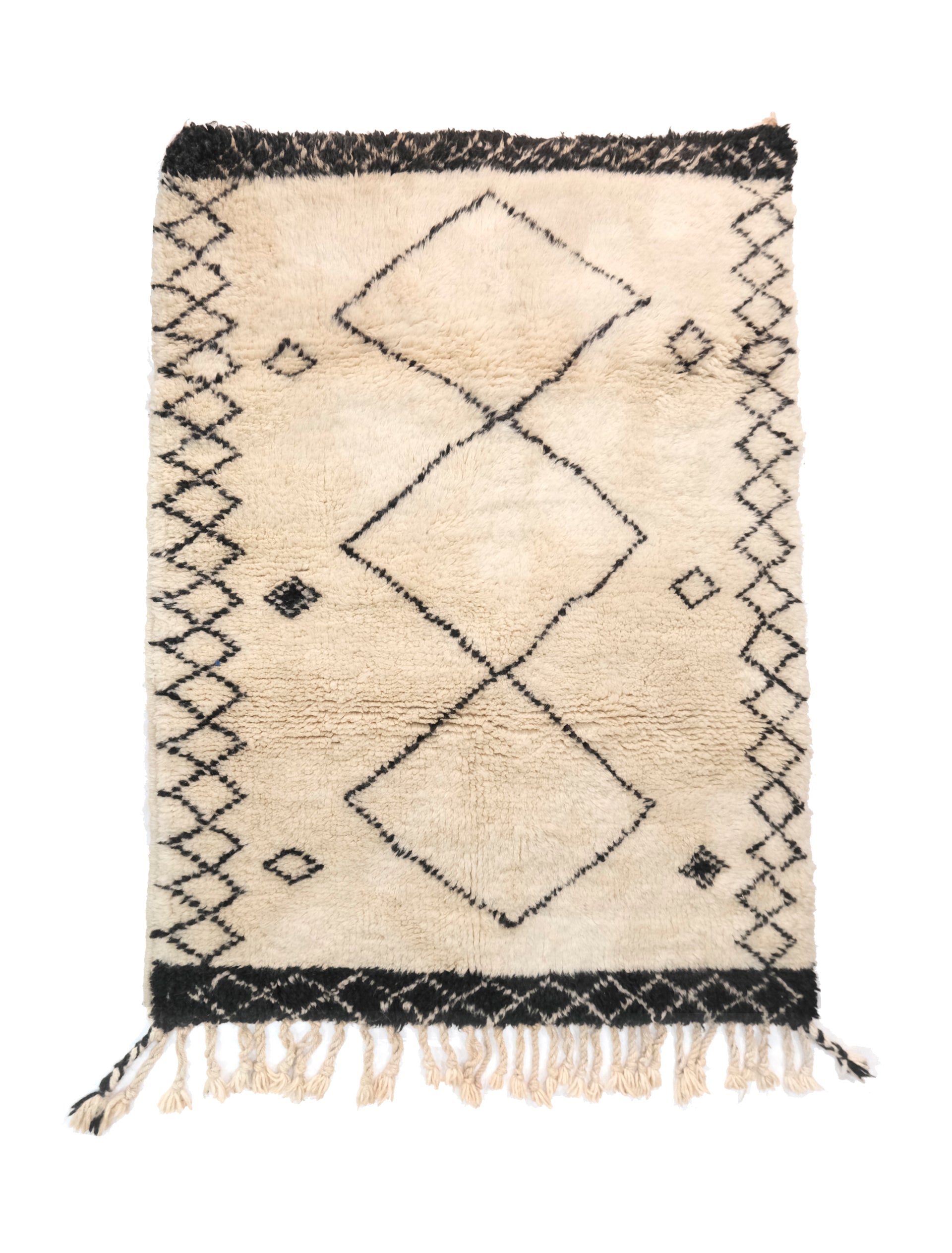 Discover elegance with our "Monochrome Diamond Ensemble" Beni Ourain Rug, sized at 3.7 x 4.9 feet. Its ivory base features three prominent diamond shapes in a delicate black outline at the center, complemented by two rows of smaller diamonds on each side. Meticulously crafted, this rug effortlessly blends tradition and modern design, making it a versatile and captivating addition to any space. Elevate your home with timeless Berber beauty.